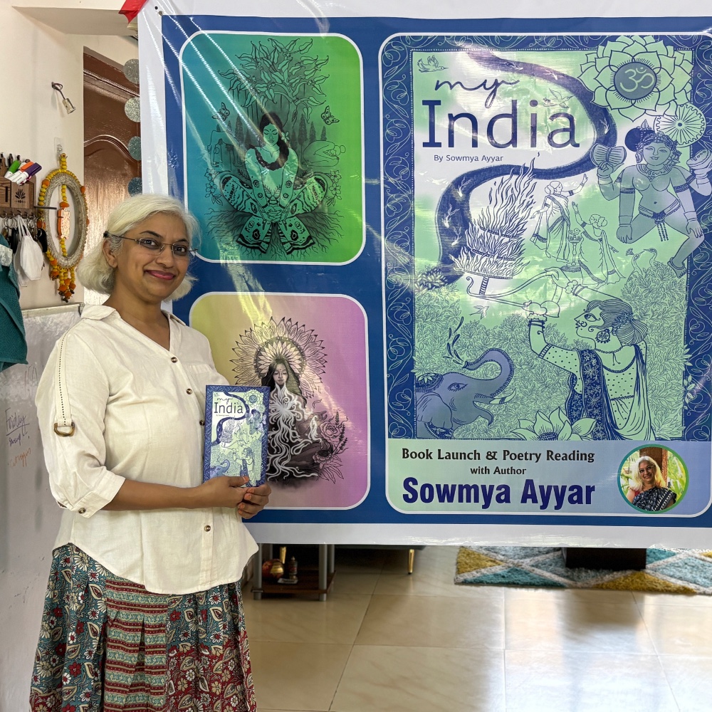 Sowmya beside the My India book-launch banner